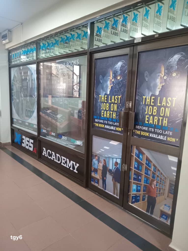 X365.AI Academy storefront in Kampala with "The Last Job On Earth" posters